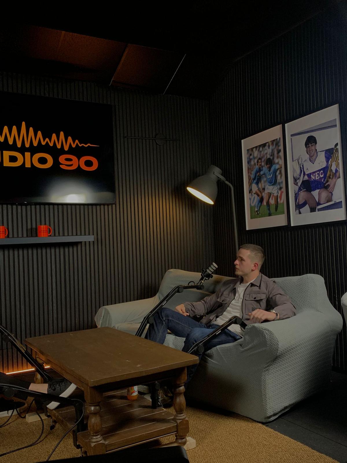 Nicky, founder of Reduce Admin, in a recording studio
